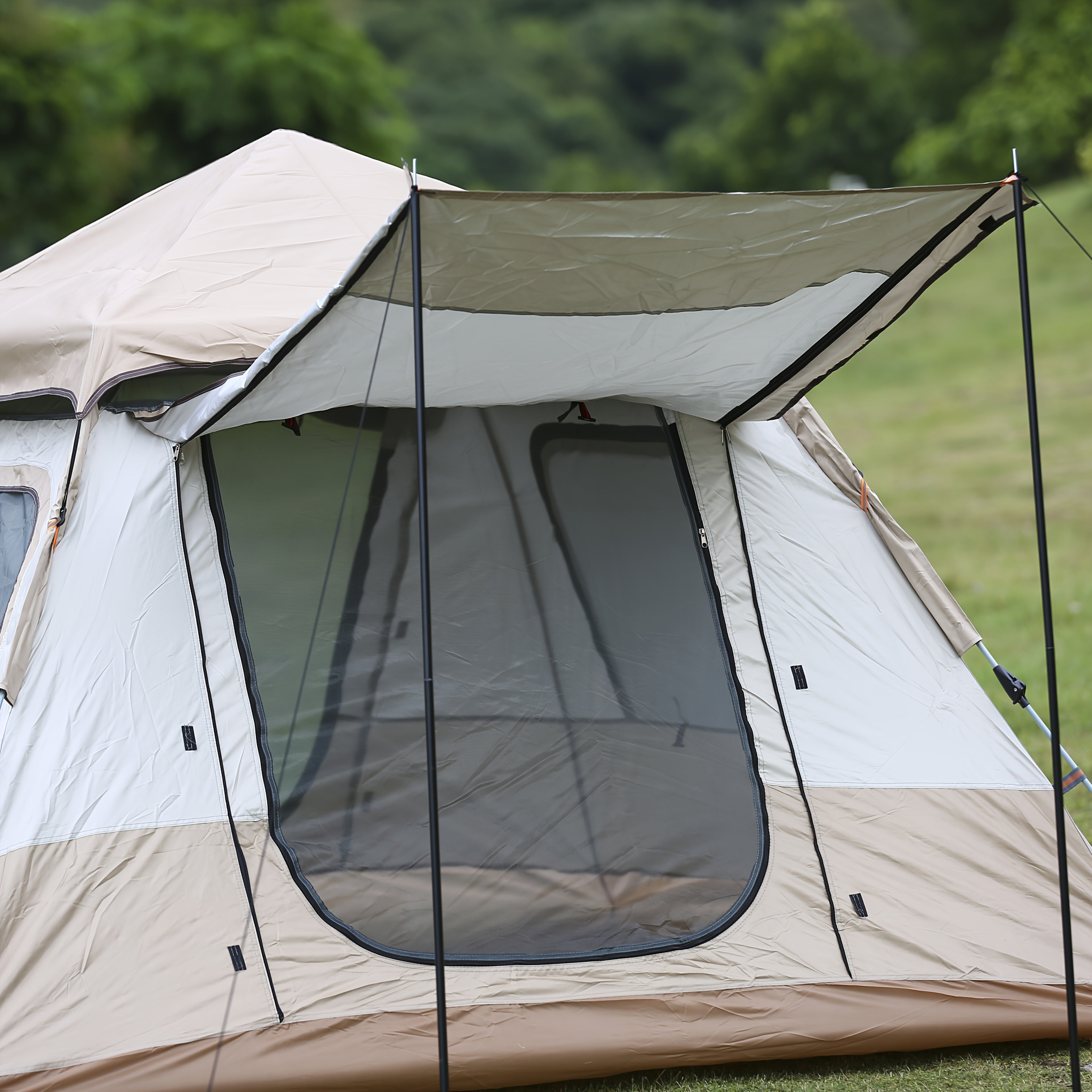 A Camping Tent That Is Portable, Has Four Sides, Opens Quickly, And Includes Double Doors And Four Windows, Designed with Panoramic Mesh for Airflow And a Vestibule